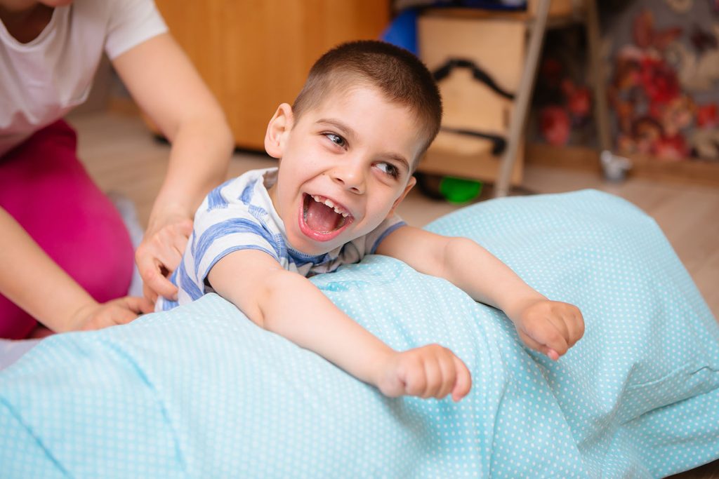 Child with CP receives physical therapy