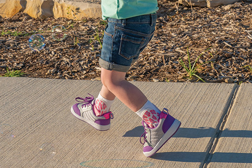 Toddler wearing SMO braces